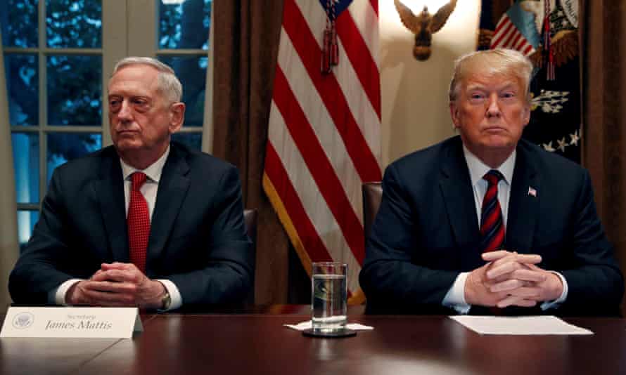 Trump speaks to the media while James Mattis minds his own business, in the cabinet room at the White House.