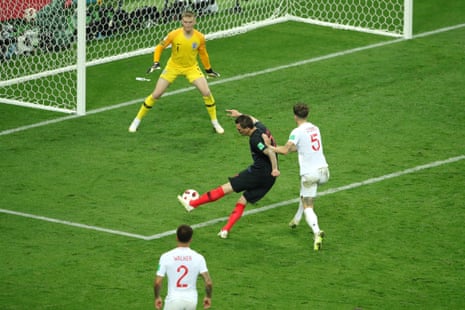 Mario Mandzukic of Croatia scores past England keeper Jordan Pickford.