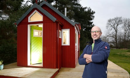Jonathan Avery with the prototype of the house he designed for the Social Bite village.
