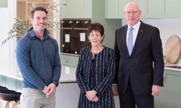 A photo from Homes by Howe’s Facebook page showing Linda and David Hurley with their builder Brendan Howe