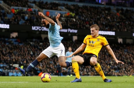 Raheem Sterling goes down after a challenge by Ryan Bennett.