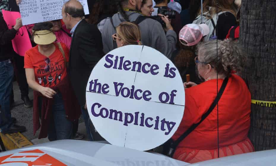 Demonstrators at the #MeToo march in Los Angeles on 12 November.