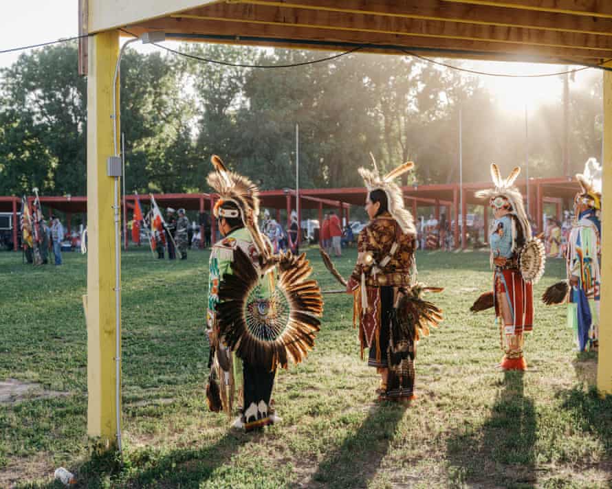 People participate in the All Veteran’s Wacipi, a pow-wow on the Pine Ridge Reservation meant to commemorate Lakota who served in the US military. Indigenous Americans serve in the military at a higher rate than any other group.