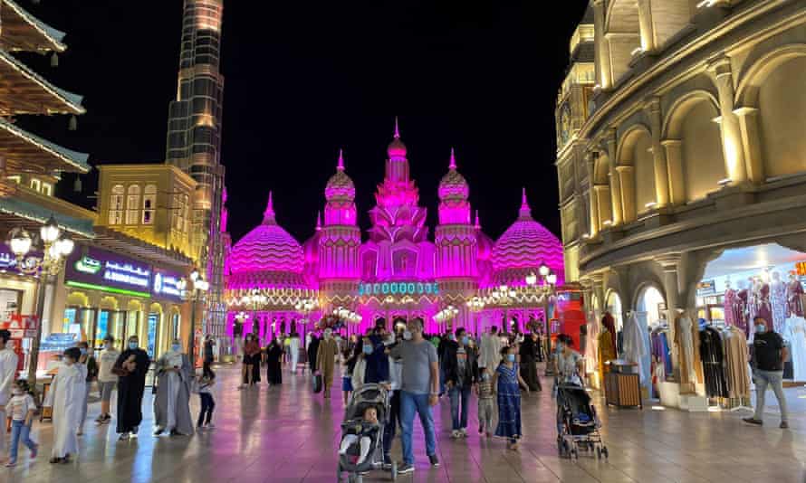 People with face masks at the Global Village in Dubai.