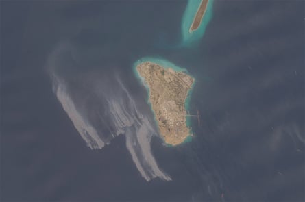 This satellite image appears to show an oil slick spreading off the coast of Kharg Island