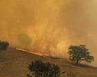 Australia heatwave live updates: bushfires raze scores of properties as new warnings issued in Victoria and NSW; Townsville braces for cyclone Koji