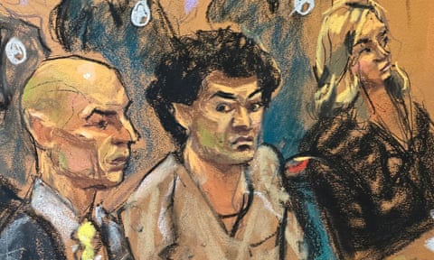 Bankman-Fried sits between his defense attorneys Marc Mukasey and Torrey Young during his sentencing.