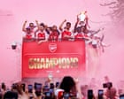Red alert: huge crowd watches Arsenal trophy parade in north London – in pictures