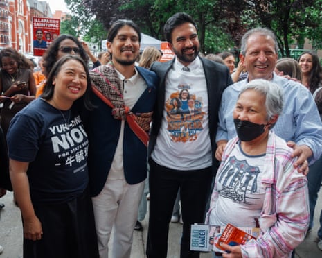 Zohran Mamdani poses with Democratic candidates and voters outside a voting place in New York on Tuesday.