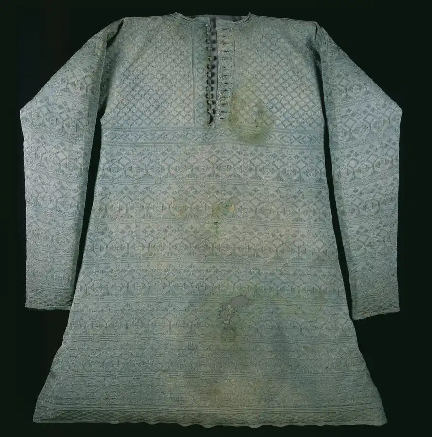 The knitted pale green silk vest worn by Charles I at his execution.