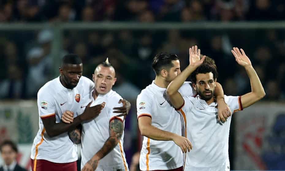 Roma’s Mohamed Salah celebrates with his team-mates after scoring against his former club Fiorentina.