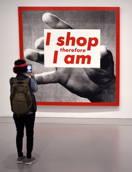 A photographic silkscreen print by Kruger titled I Shop Therefore I Am at the Hirshhorn Museum and Sculpture Garden on the National Mall in Washington DC.