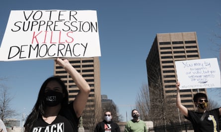 Demonstrators rally in Atlanta, Georgia, on 8 March.