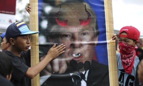 Protesters in Manila bear an image of Donald Trump with horns and fangs, in protest at the US president’s decision to recognise Jerusalem as the capital of Israel
