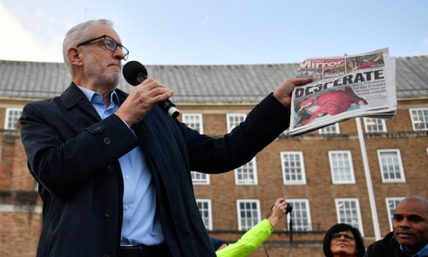 Jeremy Corbyn holds up a copy of the Daily Mirror showing a photograph of Jack Williment-Barr at a rally in Bristol, December 2019