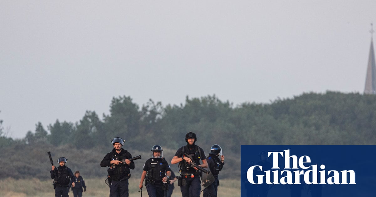 Footage shows French police clashing with people on beach as they try to leave in small boat