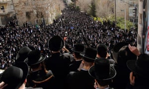Ultra-Orthodox Jews at the funeral of Rabbi Shmuel Auerbach in Jerusalem.