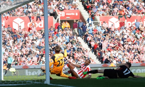 Stoke's Saido Berahino  denied a goal by Liverpool's Simon Mignolet