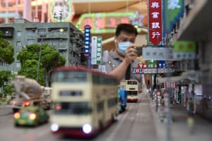 Hong Kong, ChinaVisitors look at models during ‘Love at Kwun Tong Miniature’ exhibition showcasing the old Kwun Tong at YM2 shopping mall