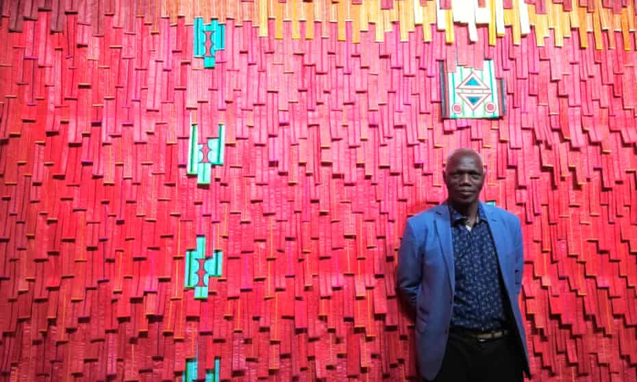 A cry for peace … Malian artist Abdoulaye Konaté with his work Touareg Rouge No 1.