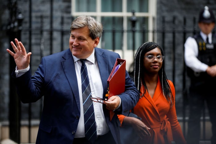 Kit Malthouse, the new education secretary, and Kemi Badenoch, the new international trade secretary, leaving No 10.