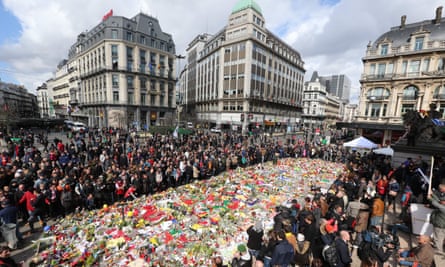 Crowds gather in Brussels’ Place de la Bourse in March to pay tribute to victims of its terrorist attacks.
