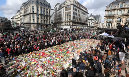 Belgians pay tribute to the victims of Brussels terror attacks, in Brussels, in March.