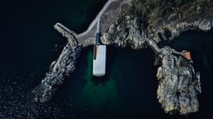 Aerial view of the structure and rocky headland