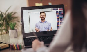 Young student watching lesson online and studying from home.