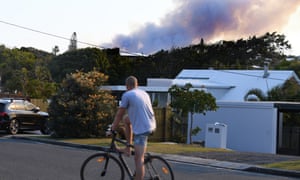 Dark smoke billows from a bushfire near Peregian Beach on the Sunshine Coast on Tuesday.