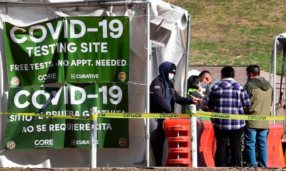 People arrive at a walk-up Covid-19 testing site in Los Angeles.