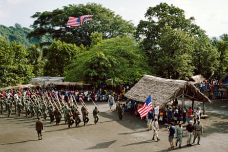 John Frum Day celebrations, Sulphur Bay, Tanna (2014), including American flags and villagers with bamboo rifles