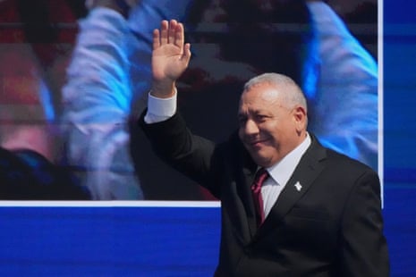 Gadi Eisenkot, leader of the Yashar party, waves to supporters after the release of the first exit poll.