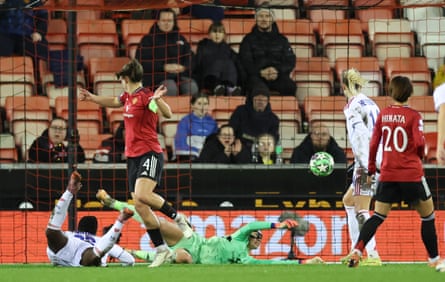 OL Lyonnes’ Tabitha Chawinga (left) scores the opening goal against Manchester United.