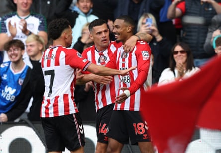 Wilson Isidor celebrates with Granit Xhaka and Chemsdine Talbi against Aston Villa