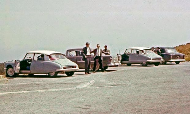 The four cars used to drive the students into France.