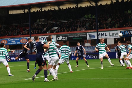 Dundee’s Clark Robertson watches his header fly towards the far corner to give Dundee the lead.