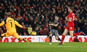 Shane Long evades the attentions of the Liverpool captain Jordan Henderson to fire Southampton’s winner past Loris Karius.