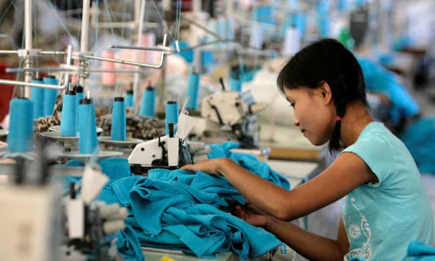 A Myanmar migrant works in a Taiwanese-owned garment factory in the northwestern Thai town of Mae Sot.