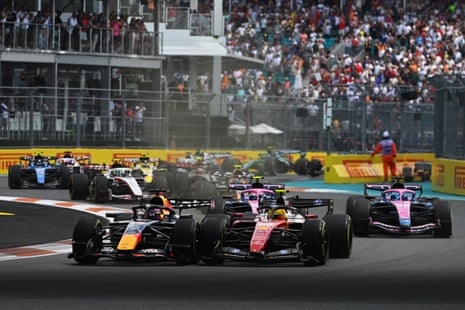 Red Bull’s Max Verstappen and Ferrari’s Lewis battle for track position.
