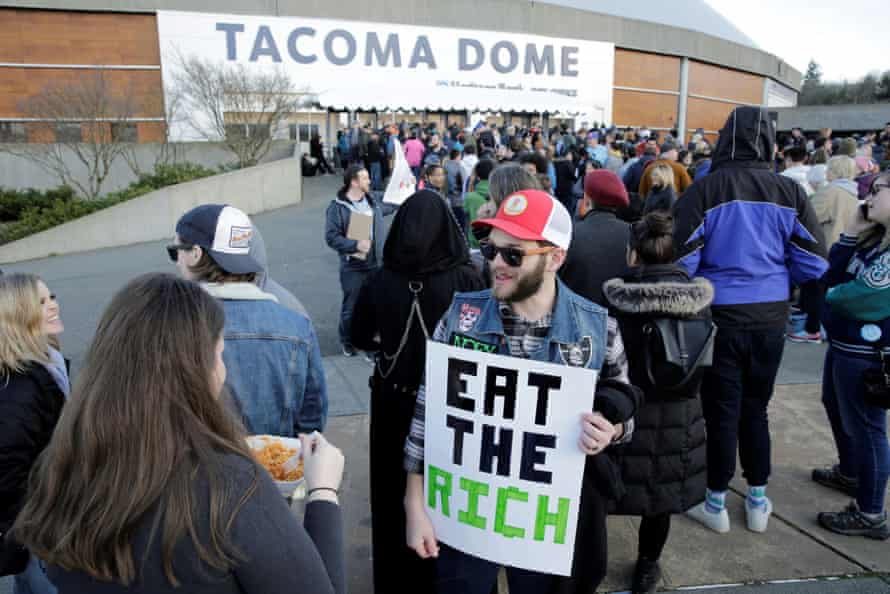 People line up at a campaign rally for Bernie Sanders at the Tacoma Dome.