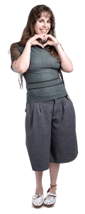 A woman making a heart shape with her hands