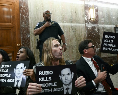 Demonstrators protest the lack of funding for PEPFAR.