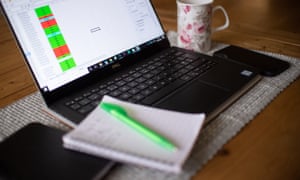 Laptop set up on dining table for home working