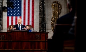 Biden promised America had 'reached a new moment in the fight against Covid-19'.