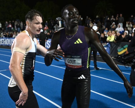 Gout Gout (right) congratulates Lachlan Kennedy on winning the Peter Norman Memorial 200m