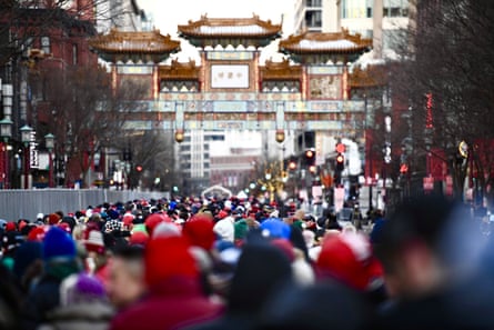 people waiting in droves in the street