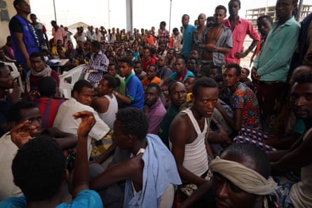 Ethiopians awaiting repatriation are seen in a bombed-out football stadium in Aden, Yemen