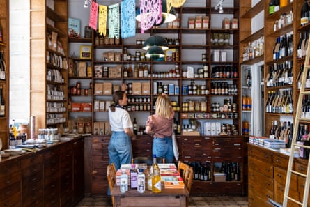 Provisions’ shelves are laden with food, wine and culinary books.