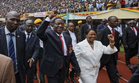 Emmerson Mnangagwa and his wife Auxillia arrive at the presidential inauguration ceremony in Harare on Friday.